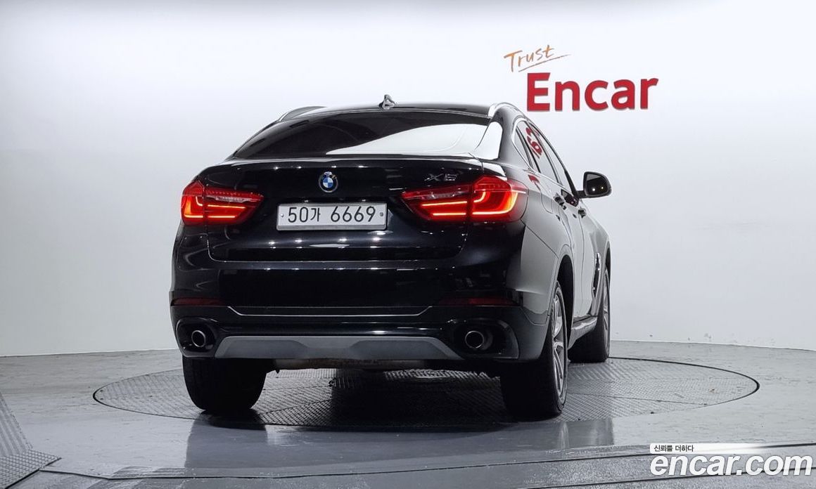 BMW X6 (F16) фото 4
