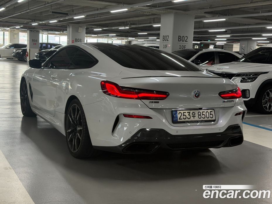 BMW 8-Series (G15) фото 4