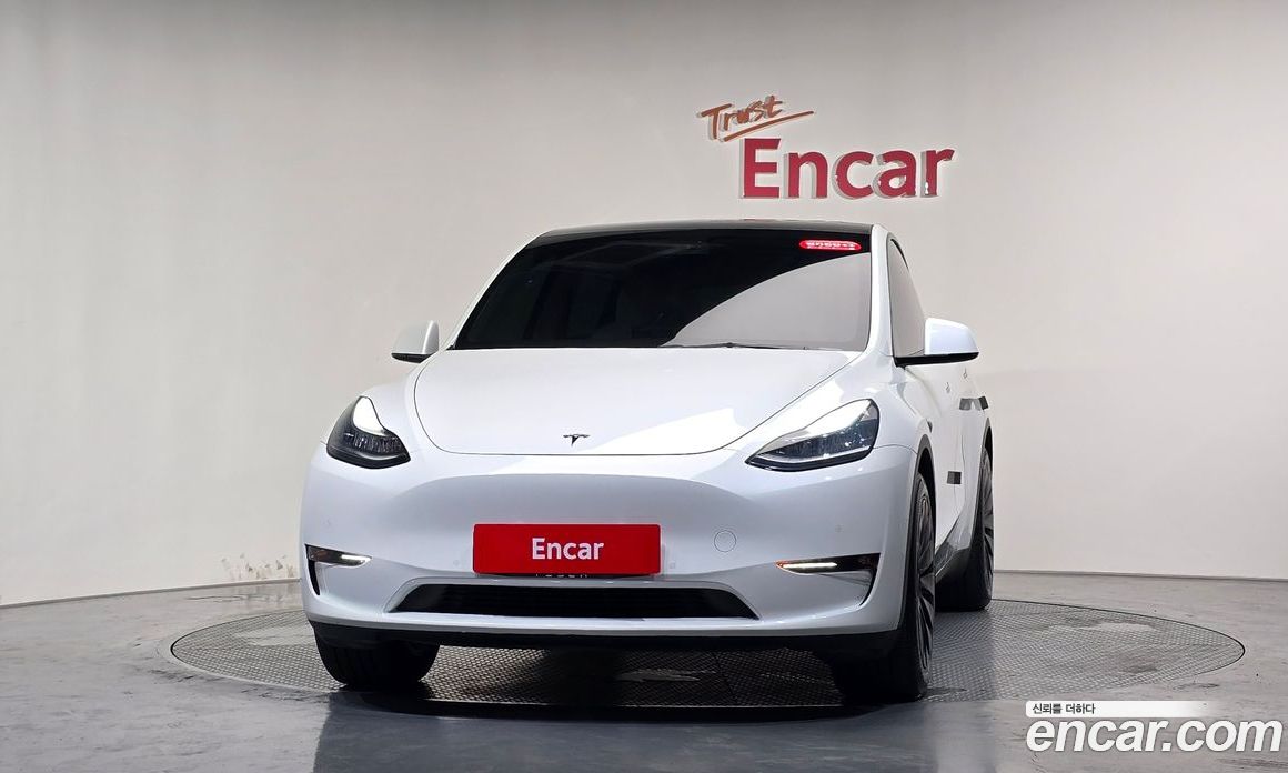 Tesla Model Y фото 2