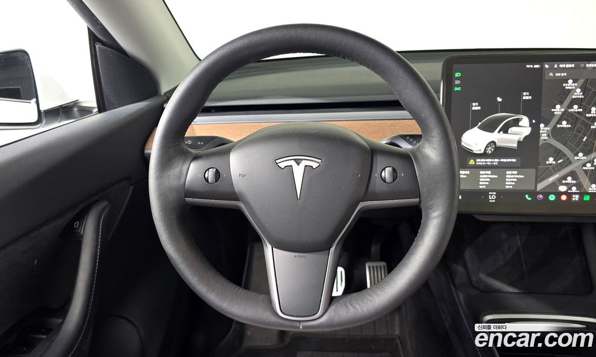 Tesla Model Y фото 12