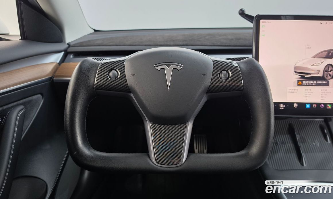 Tesla Model 3 фото 12