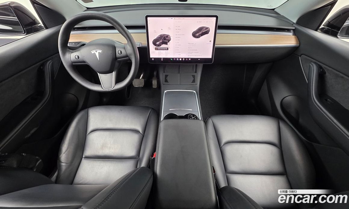Tesla Model Y фото 7