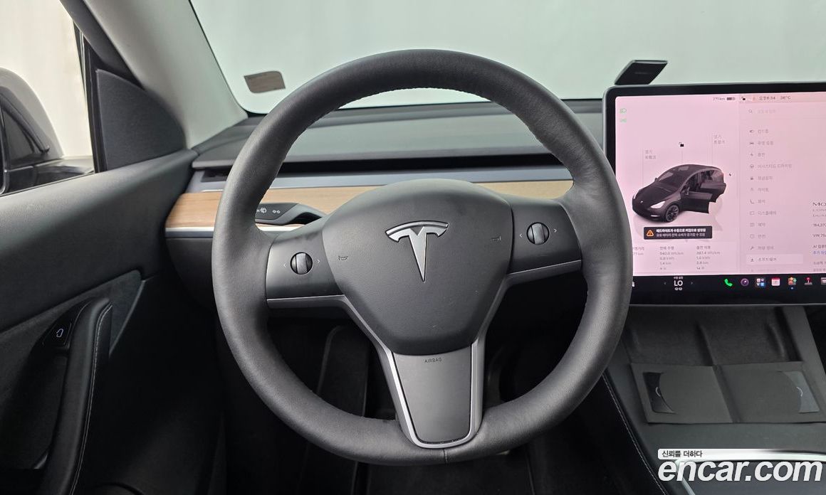 Tesla Model Y фото 13
