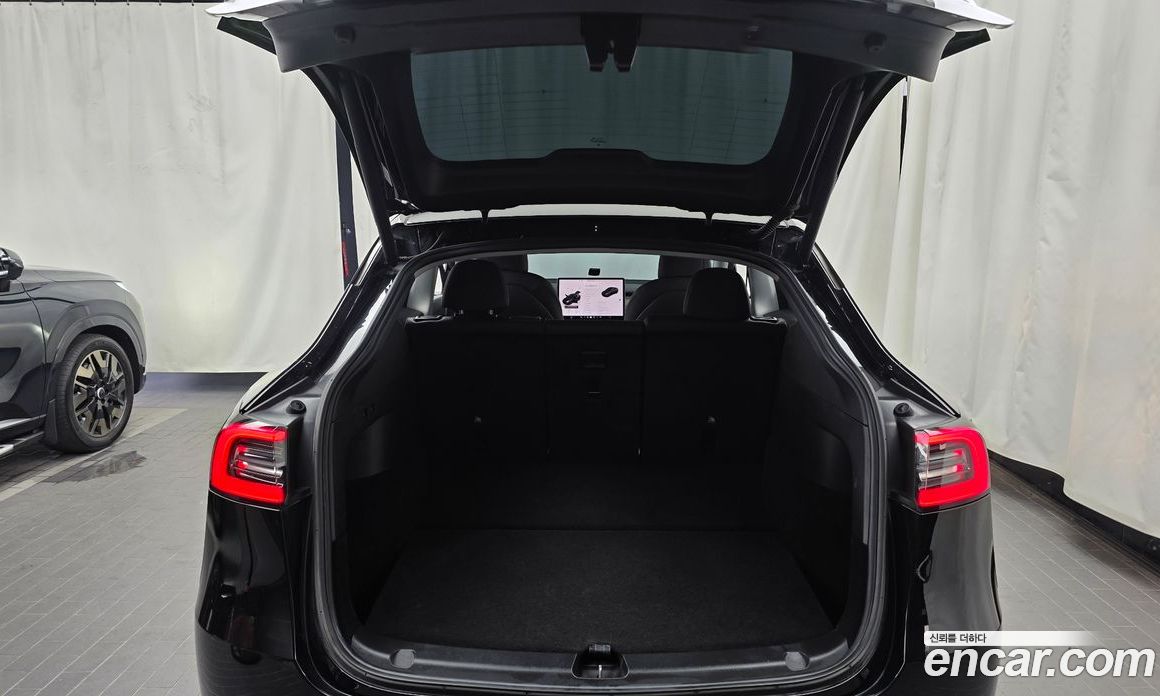 Tesla Model Y фото 20