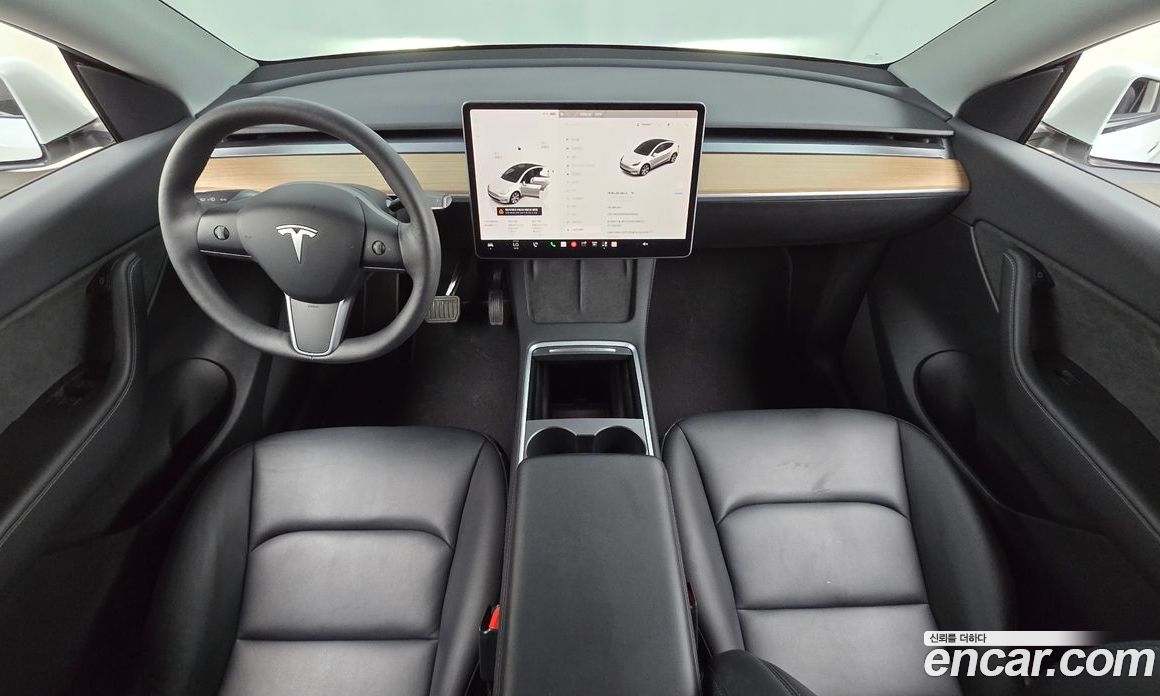 Tesla Model Y фото 7