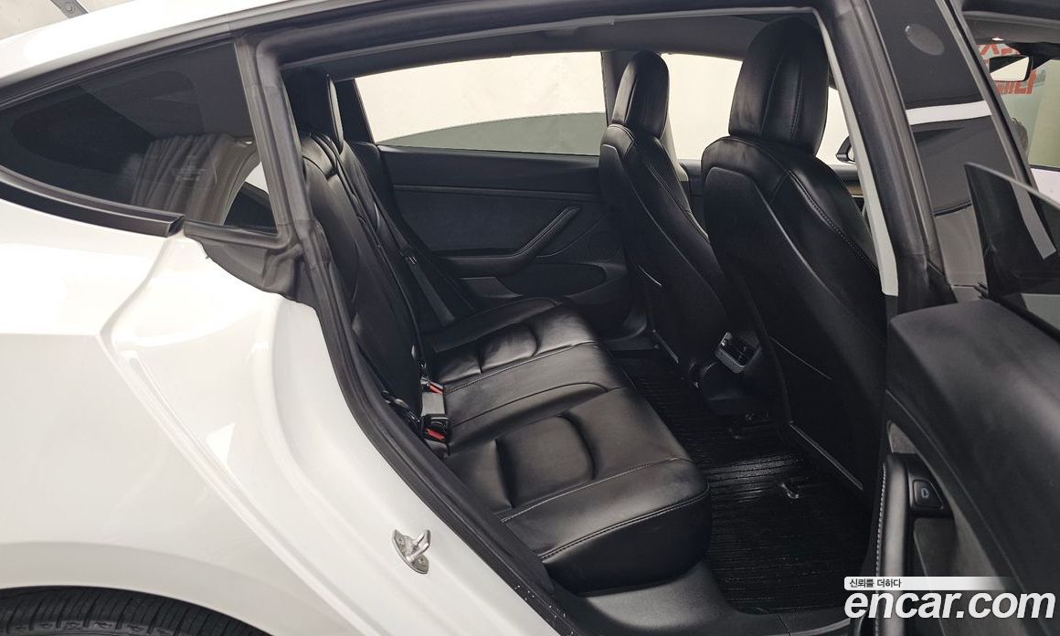 Tesla Model 3 фото 8