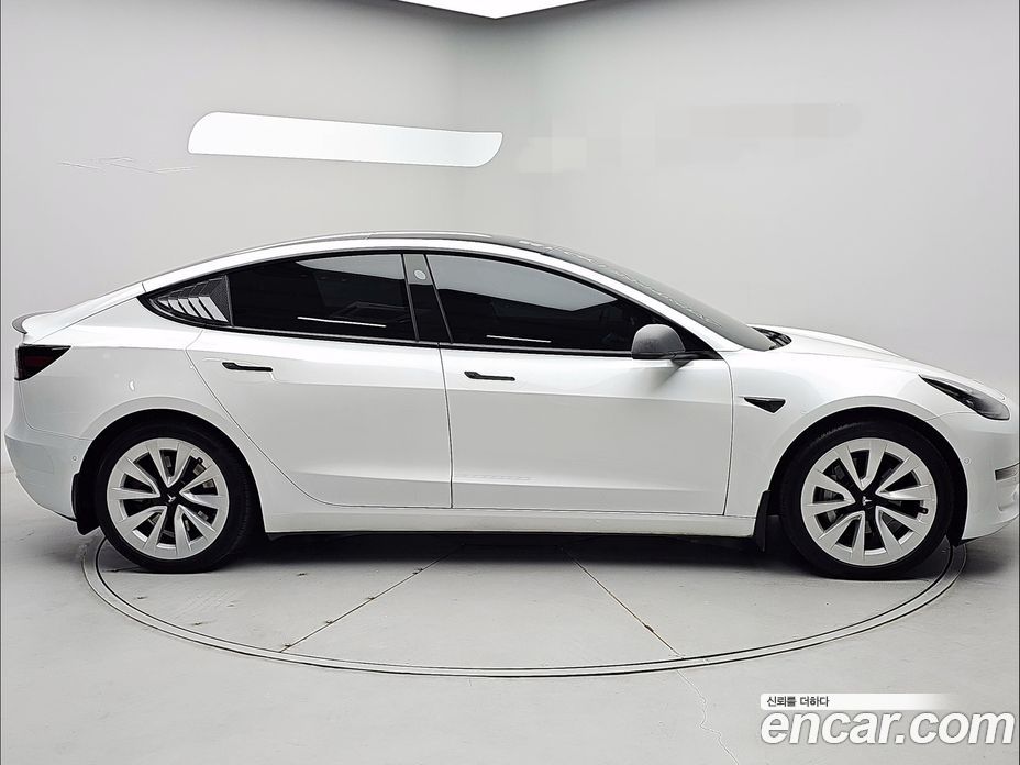 Tesla Model 3 фото 2