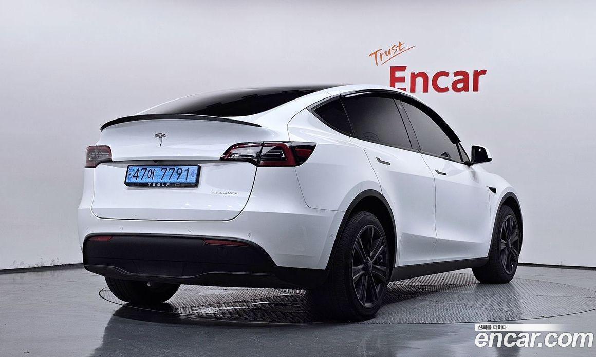 Tesla Model Y фото 2