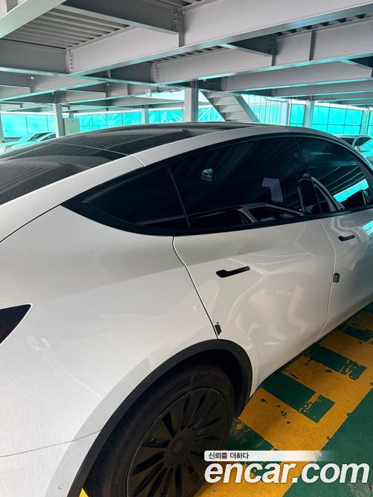 Tesla Model Y фото 2