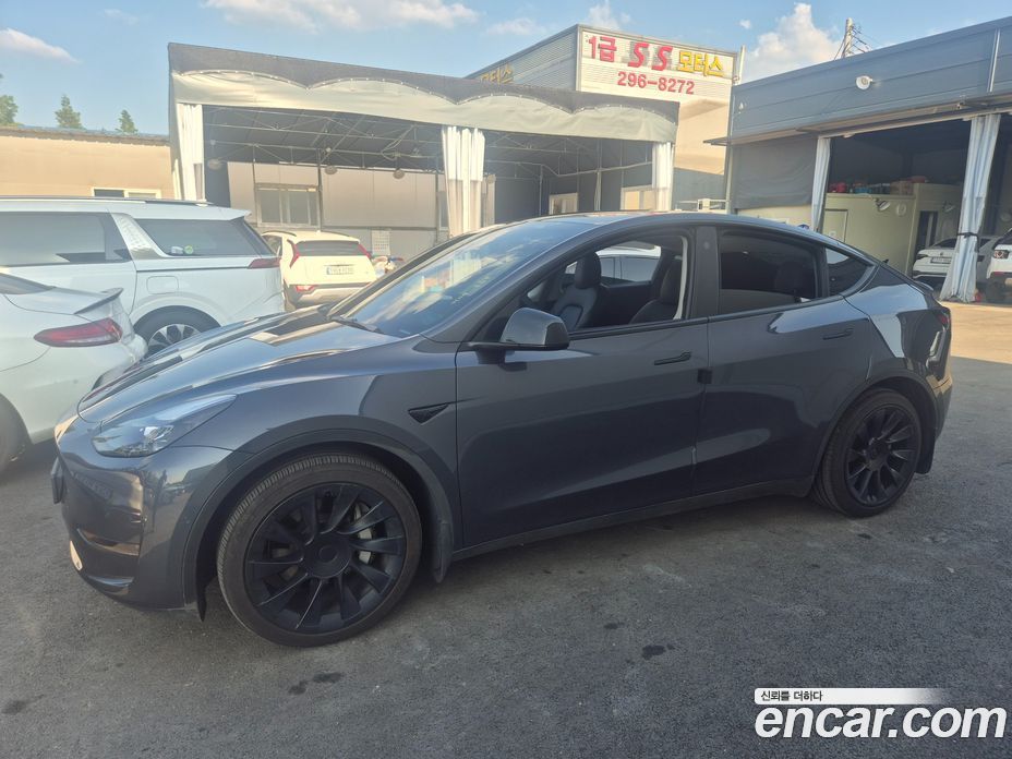 Tesla Model Y фото 2