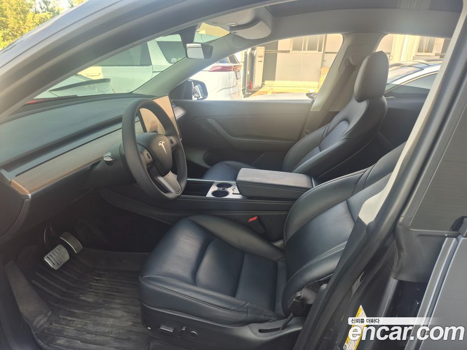 Tesla Model Y фото 7