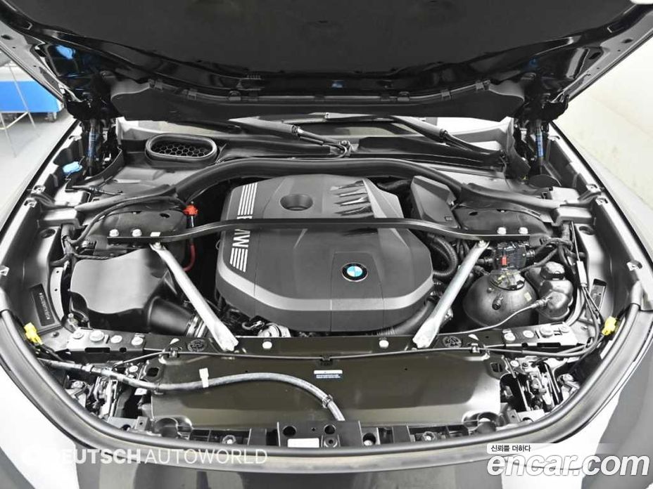 BMW 7-Series (G70) фото 6