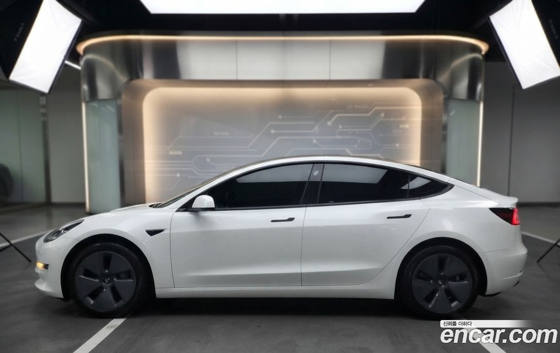 Tesla Model 3 фото 3