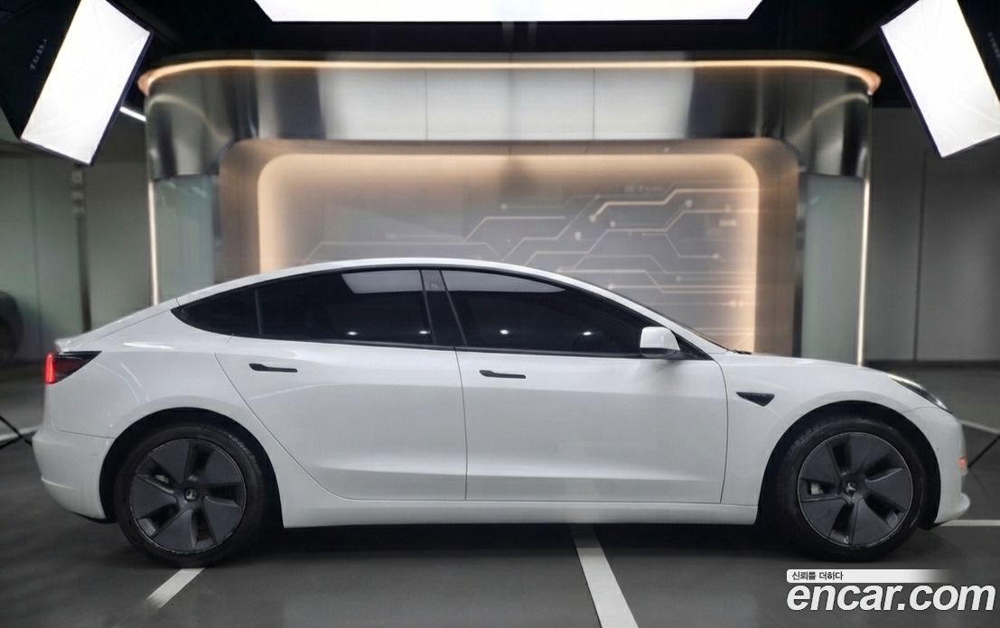 Tesla Model 3 фото 7