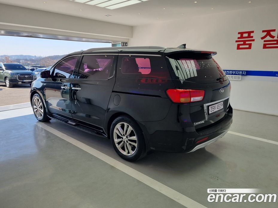 Kia Carnival 3rd Gen фото 17