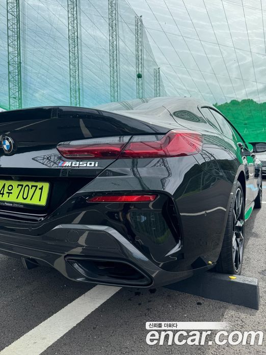 BMW 8-Series (G15) фото 12