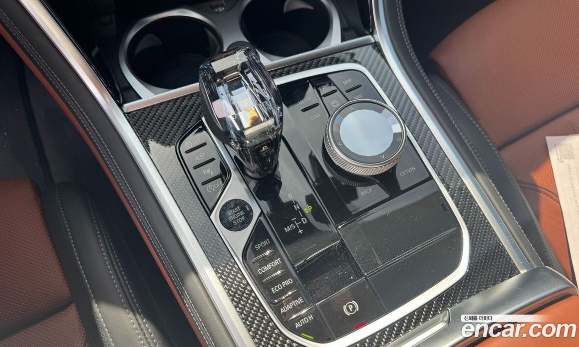 BMW 8-Series (G15) фото 7