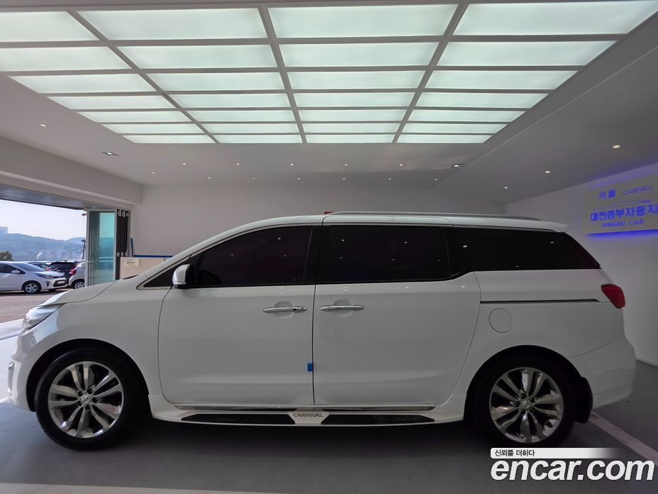 Kia Carnival 3rd Gen фото 14