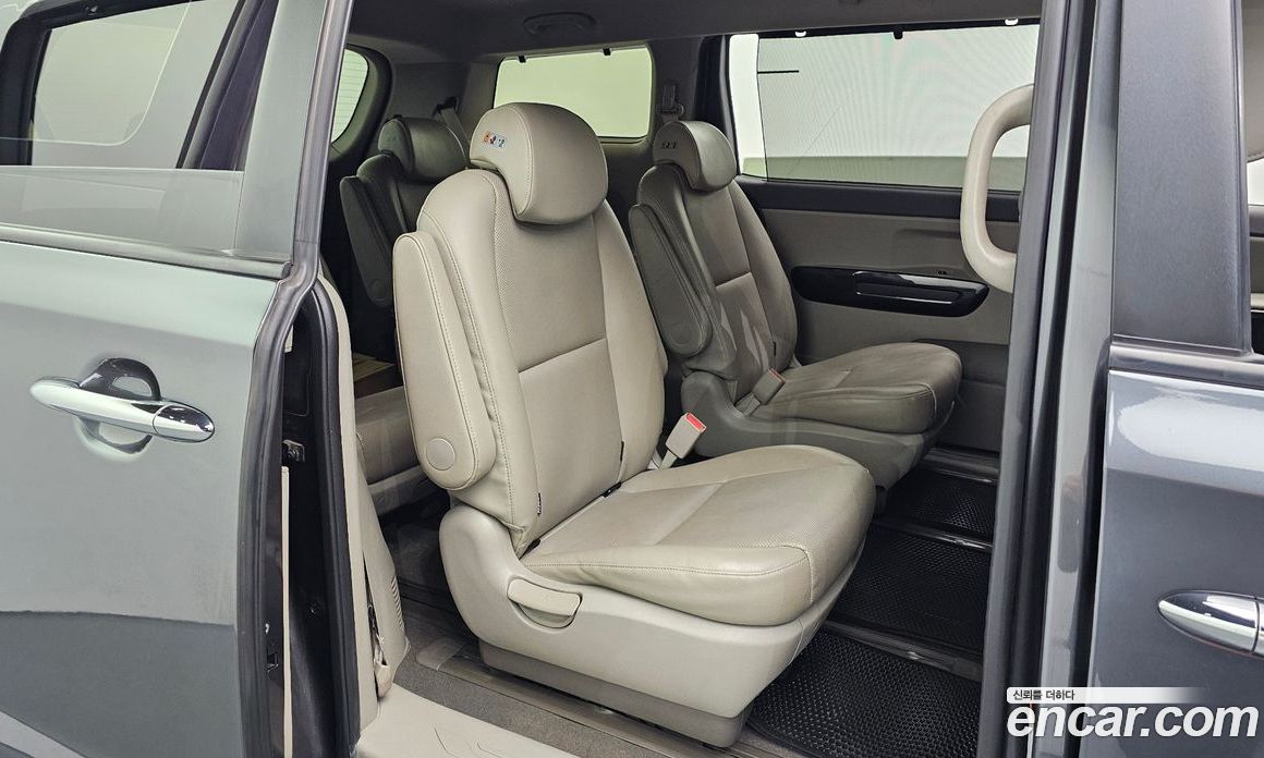 Kia Carnival 3rd Gen фото 11