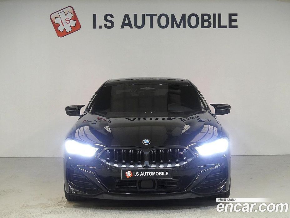 BMW 8-Series (G15) фото 3