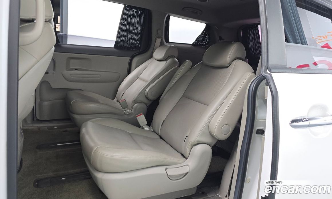 Kia Carnival 3rd Gen фото 11