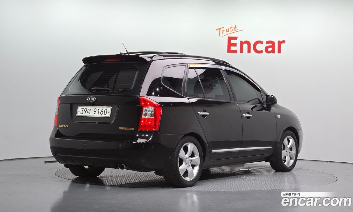Kia Carens 2nd Gen фото 2