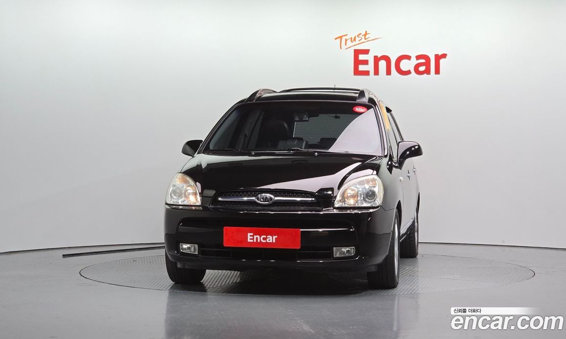 Kia Carens 2nd Gen фото 3