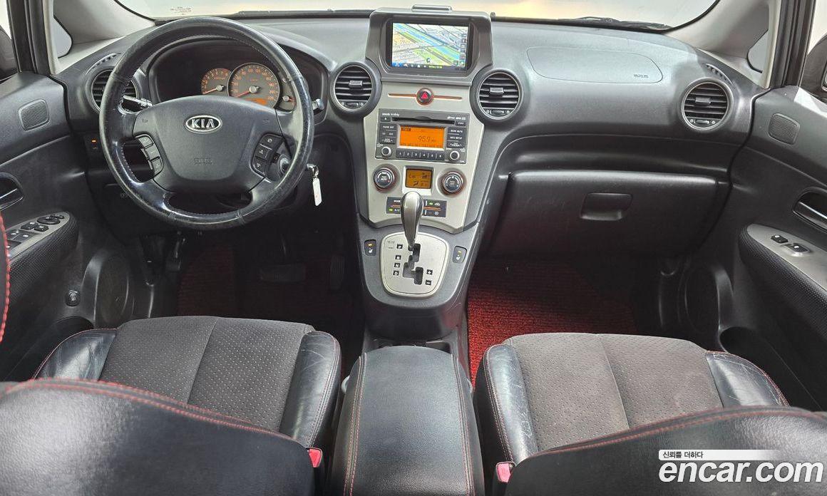 Kia Carens 2nd Gen фото 7