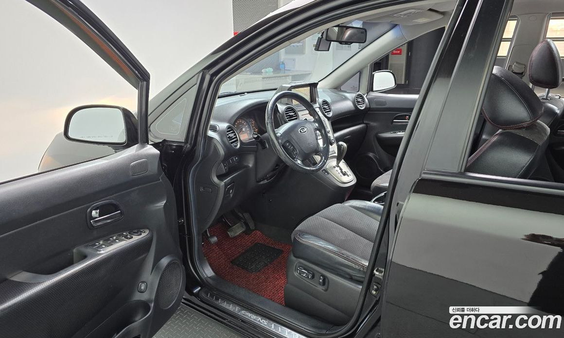 Kia Carens 2nd Gen фото 10