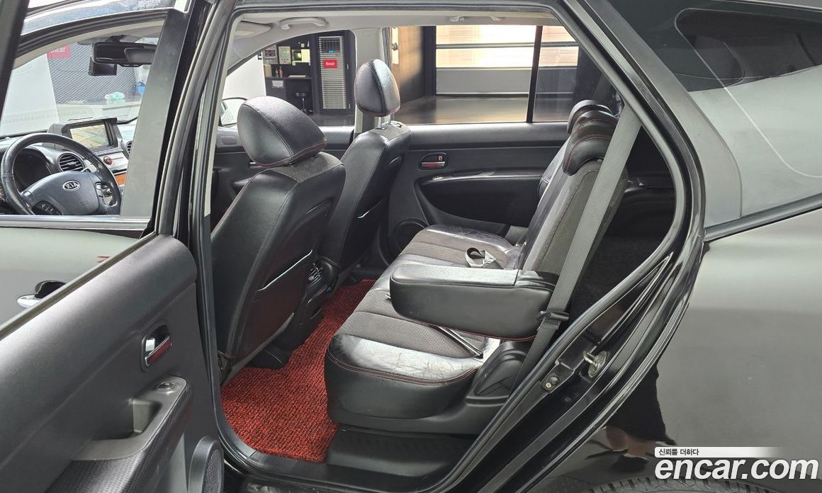 Kia Carens 2nd Gen фото 11