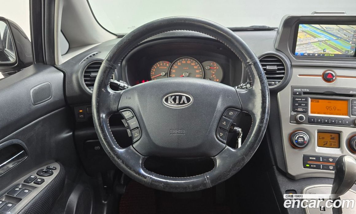 Kia Carens 2nd Gen фото 12