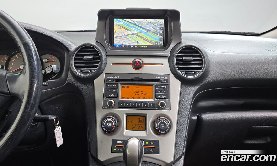 Kia Carens 2nd Gen фото 13