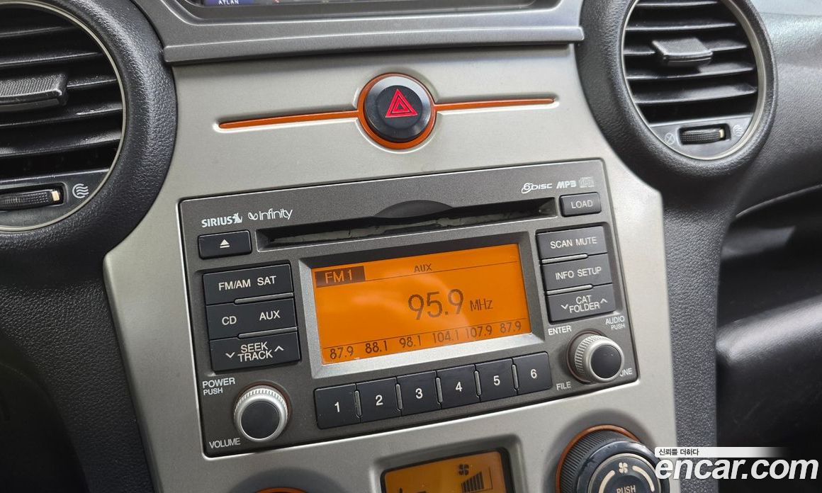 Kia Carens 2nd Gen фото 14