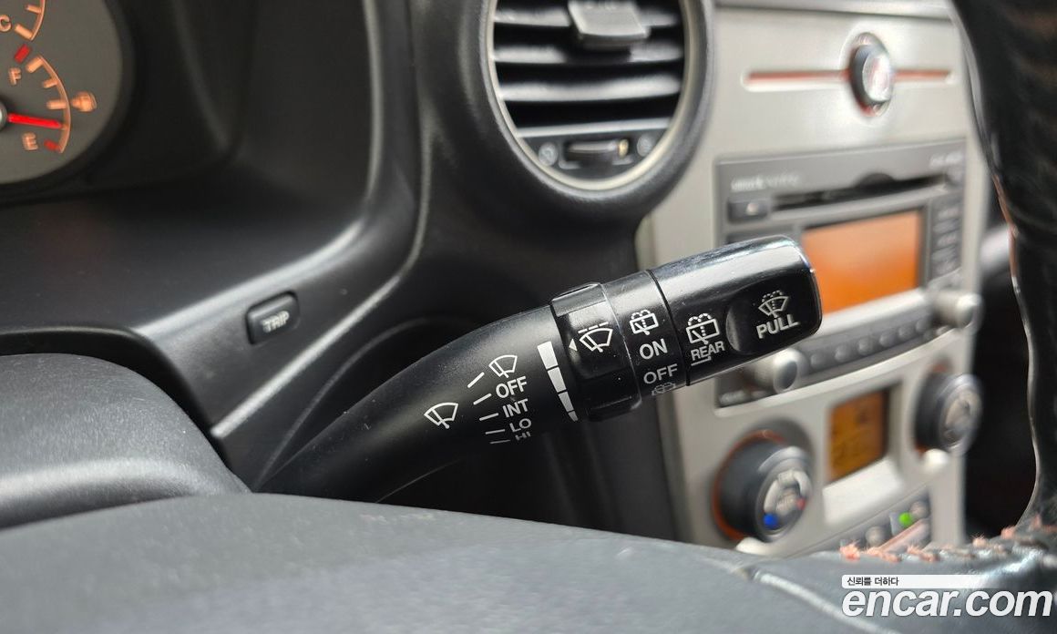 Kia Carens 2nd Gen фото 20