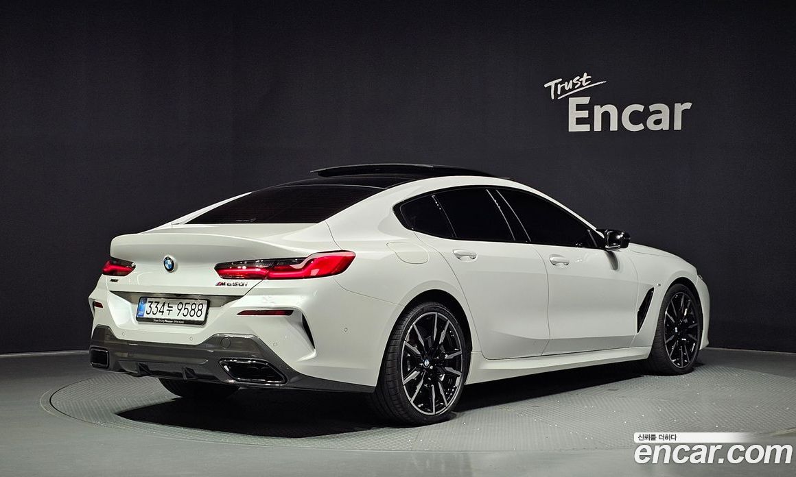BMW 8-Series (G15) фото 2