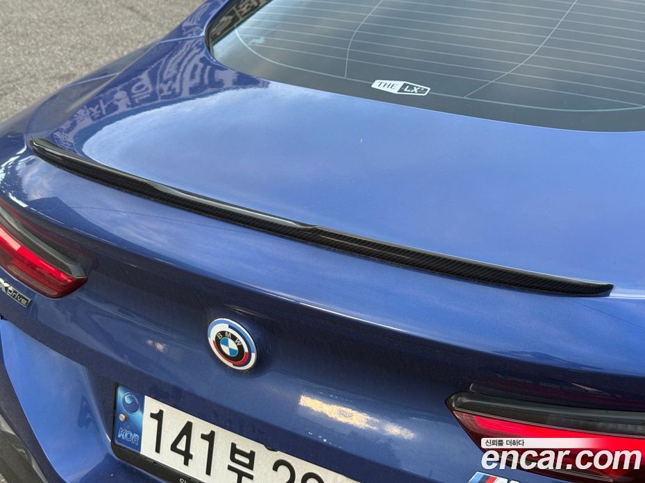 BMW 8-Series (G15) фото 19