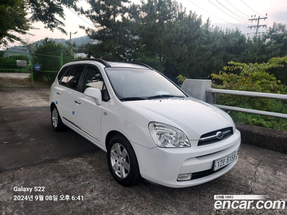 Kia Carens 2nd Gen фото 2