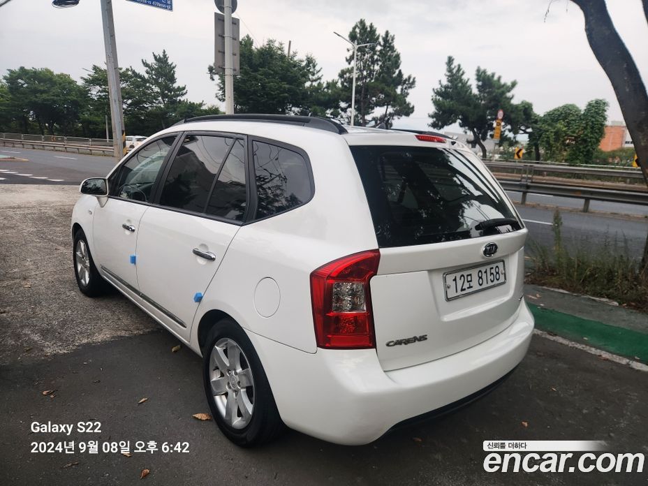 Kia Carens 2nd Gen фото 4