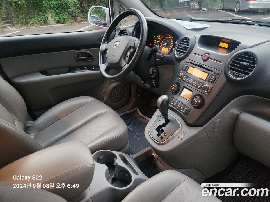 Kia Carens 2nd Gen фото 12