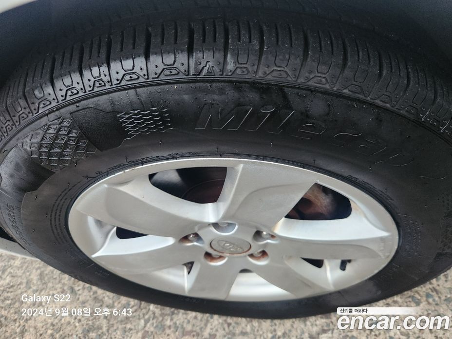 Kia Carens 2nd Gen фото 13