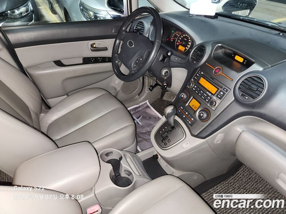 Kia Carens 2nd Gen фото 19