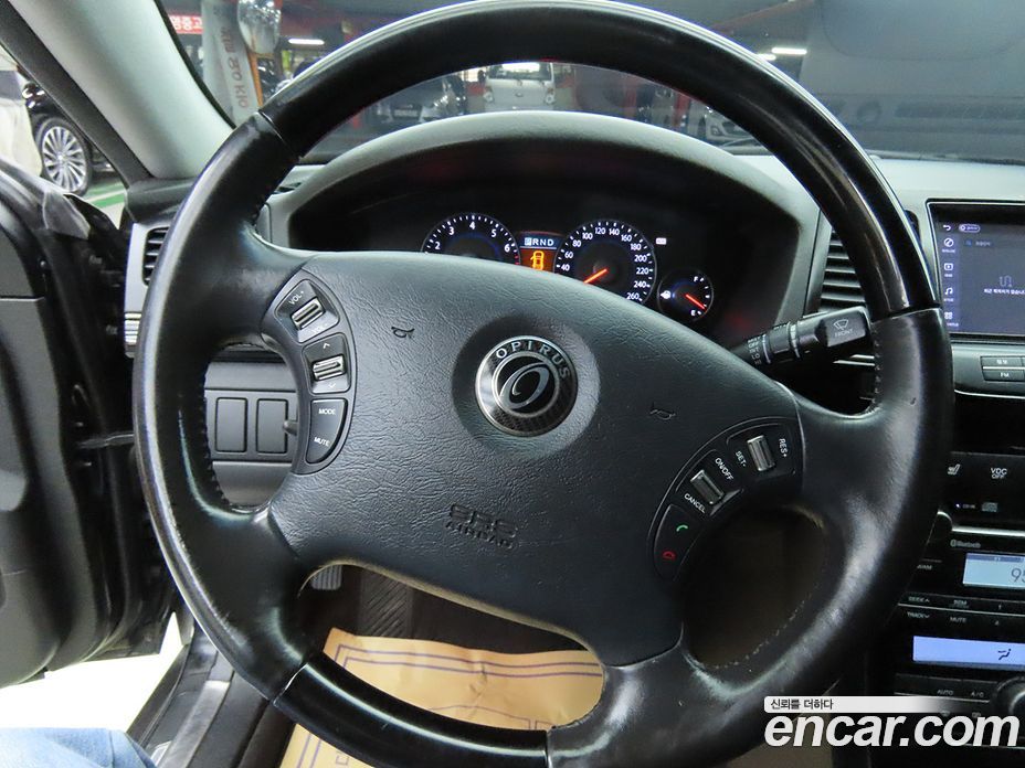 Kia Opirus Premium фото 8
