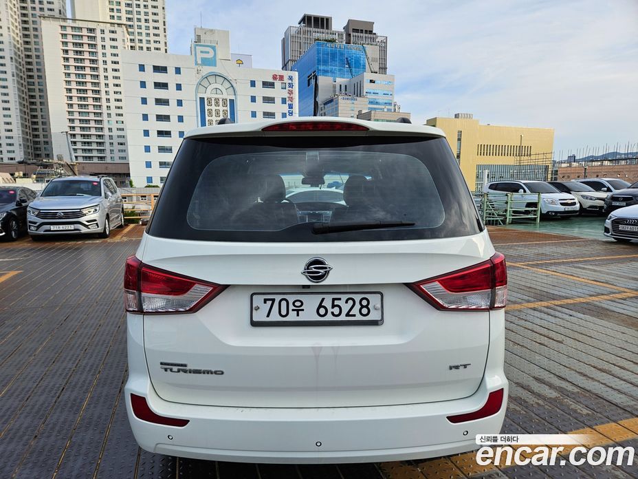 SsangYong (KG Mobility) Korando Turismo фото 5