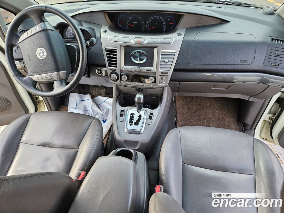 SsangYong (KG Mobility) Korando Turismo фото 10