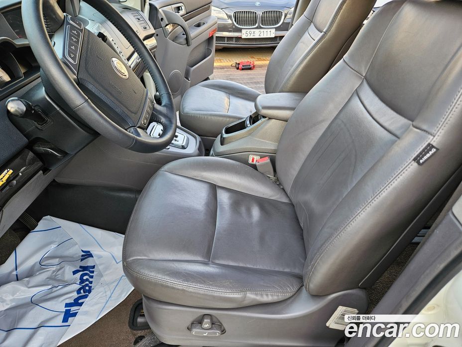 SsangYong (KG Mobility) Korando Turismo фото 11