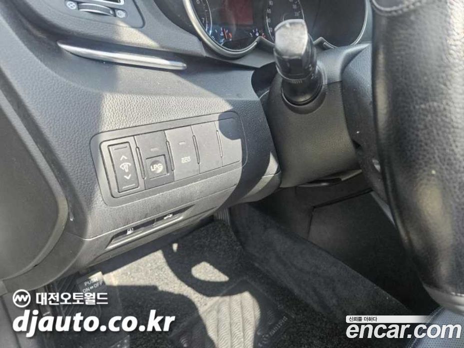 Kia K7 Prestige фото 11
