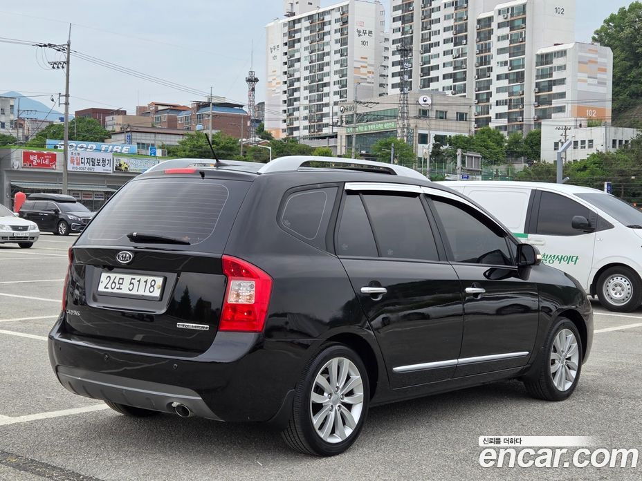 Kia Carens 2nd Gen фото 4