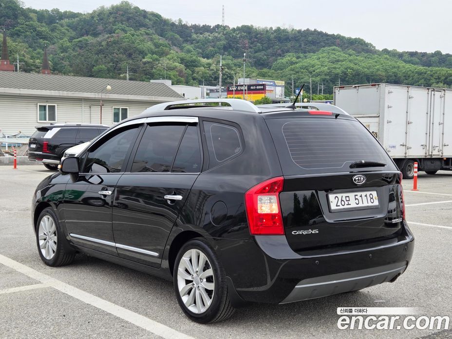Kia Carens 2nd Gen фото 6