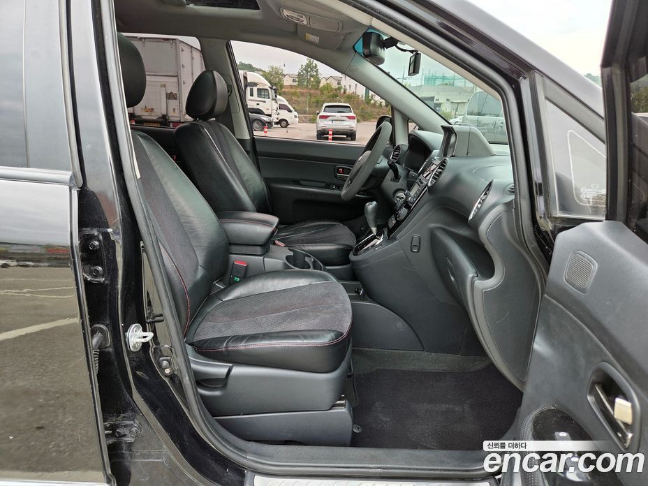 Kia Carens 2nd Gen фото 13