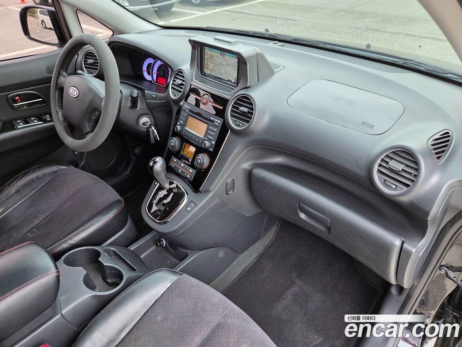 Kia Carens 2nd Gen фото 14